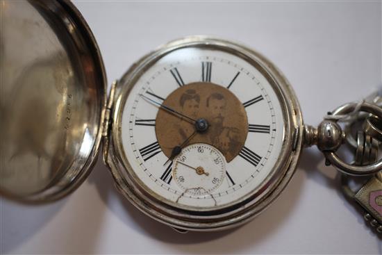 An early 20th century Russian engine turned 84 zolotnik silver military related hunter keywind pocket watch,